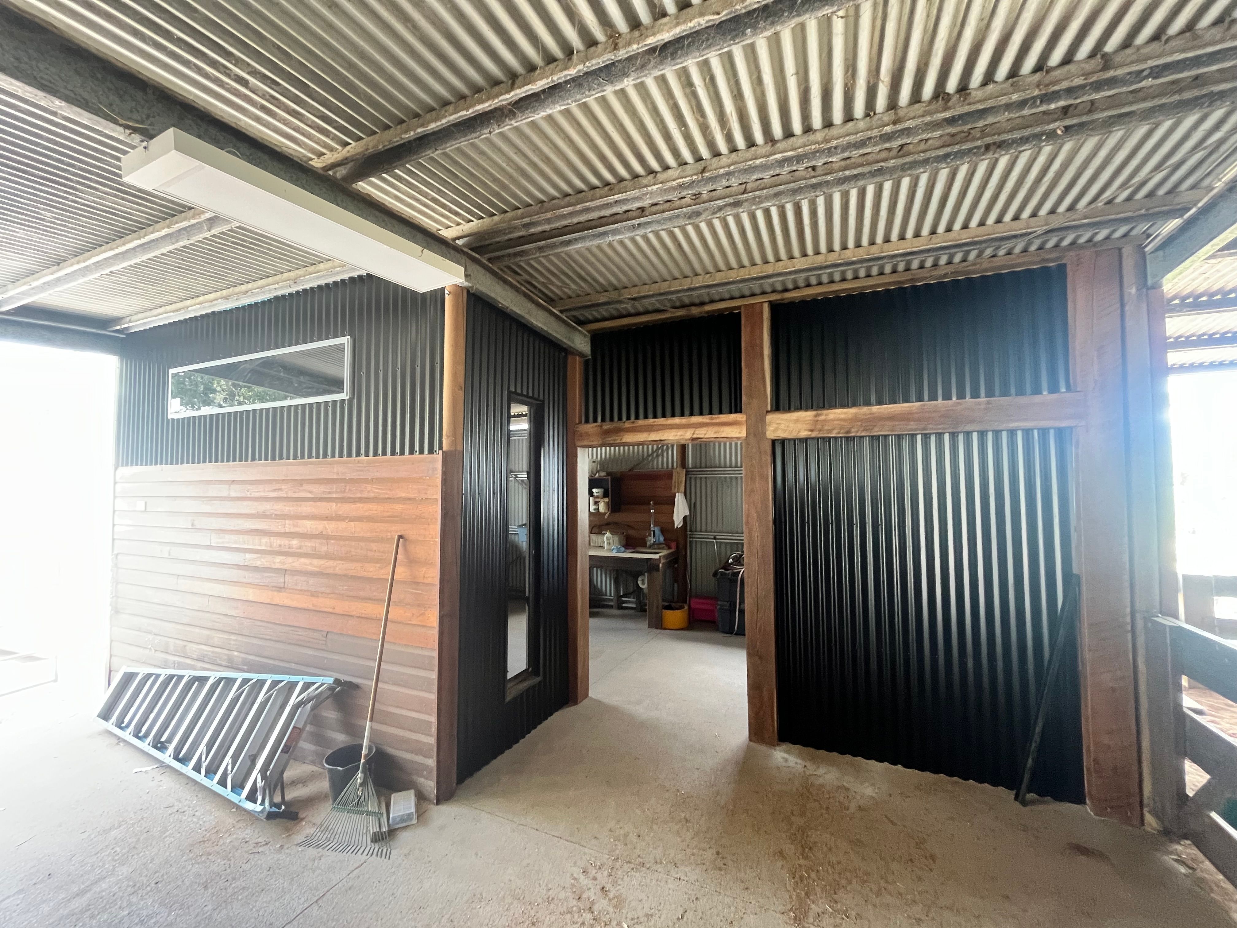 Dark metal cladding interior fitout