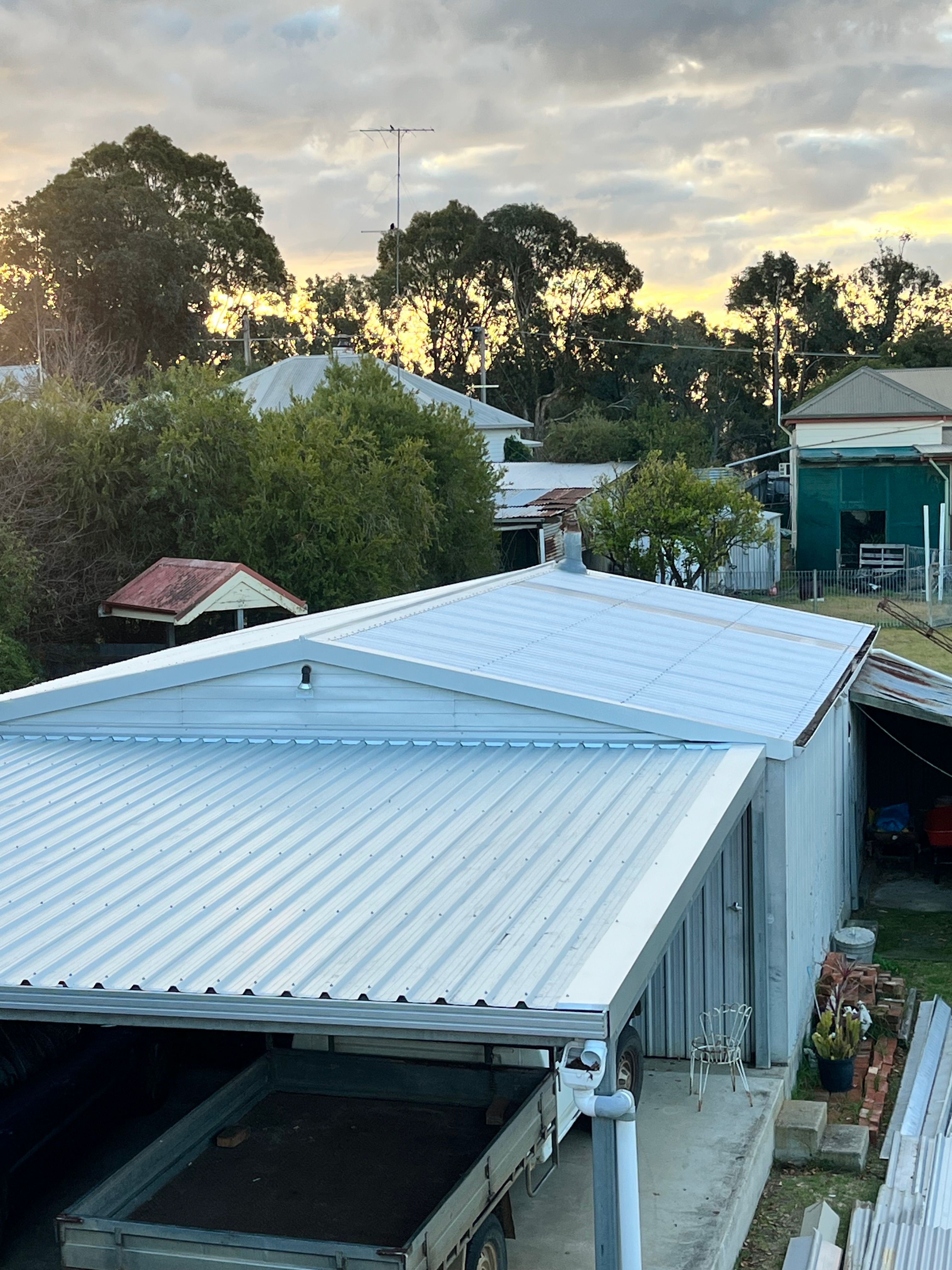 White metal roof at sunset