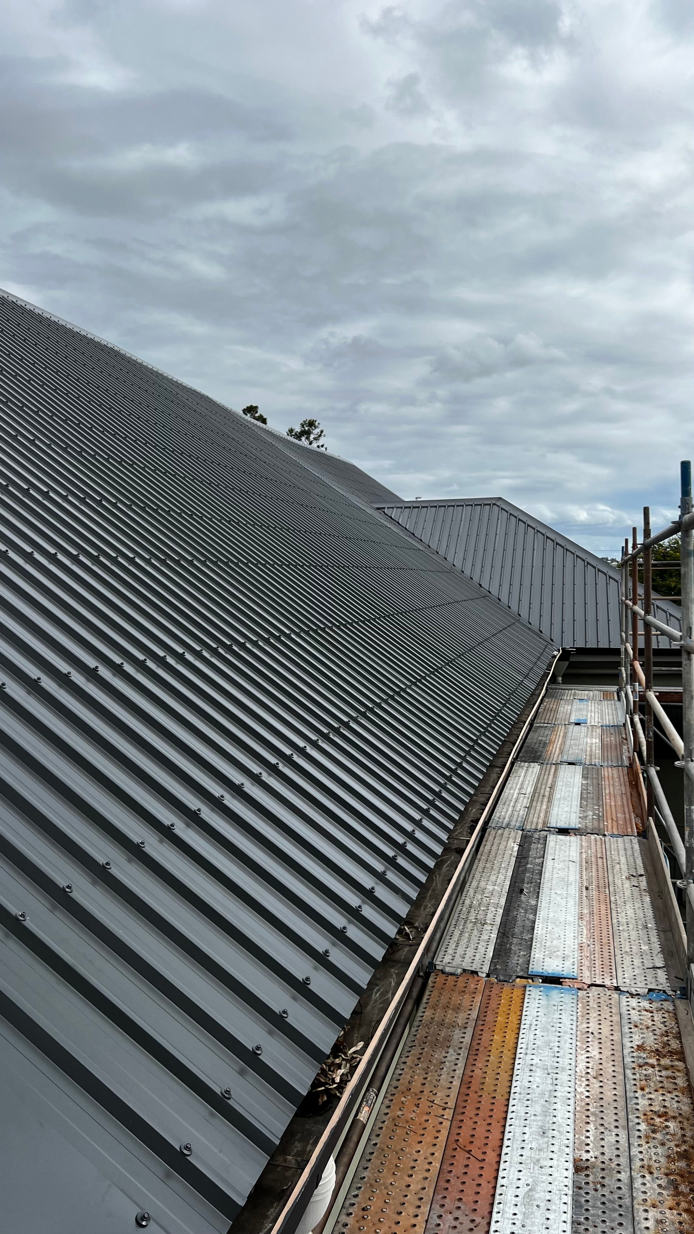 Roof sheeting installation